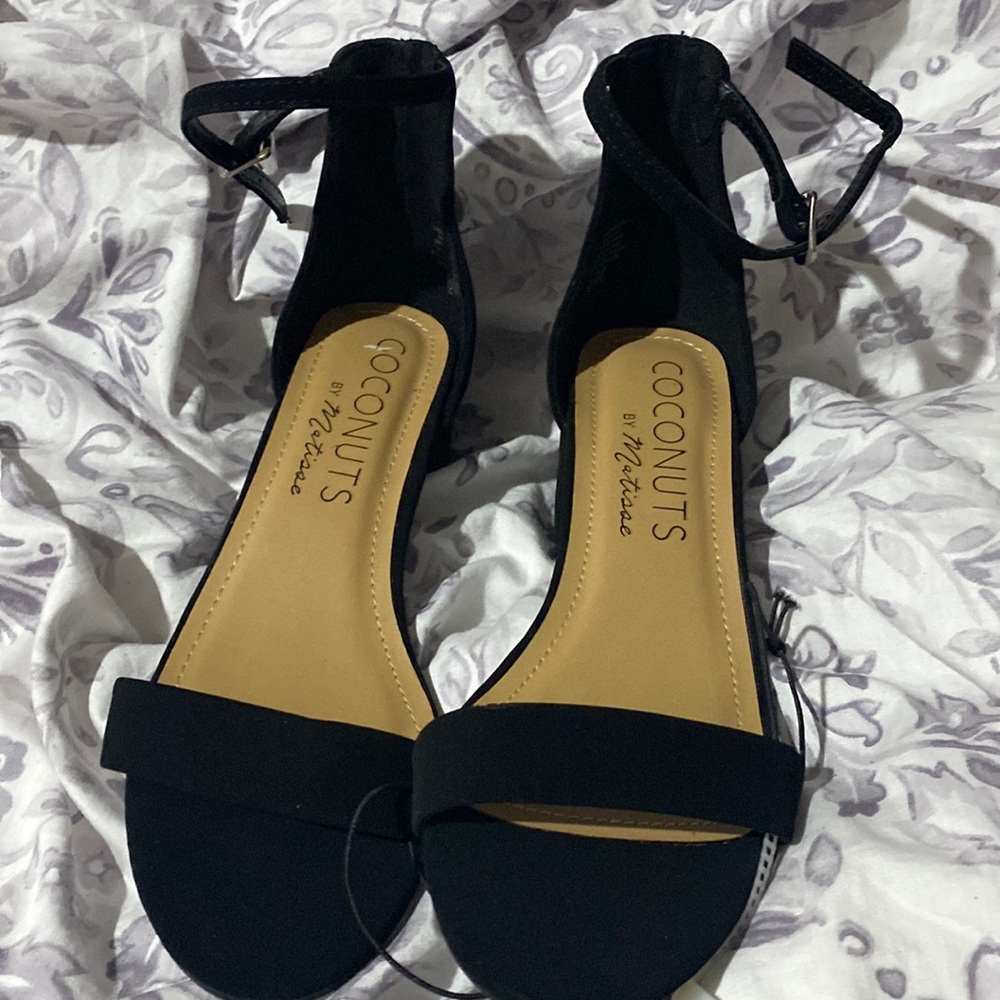 Ankle strapped coconuts black heels